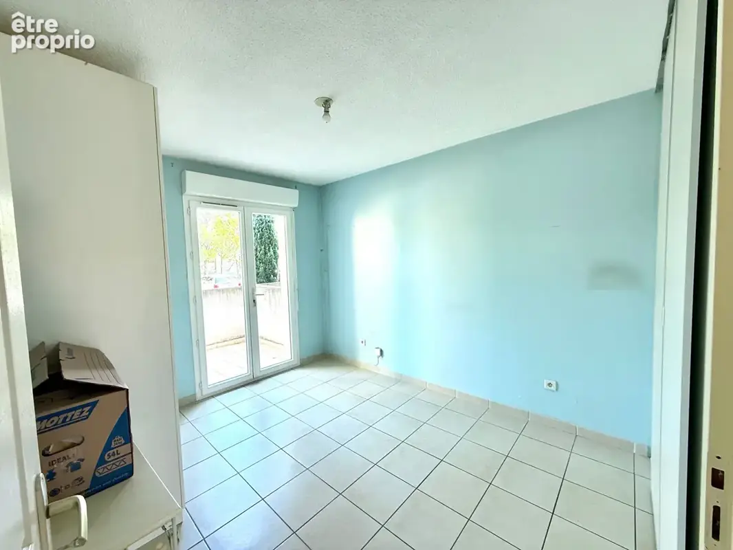 Appartement en rez-de-jardin avec terrasse et place de parking privative63,65 - photo 9