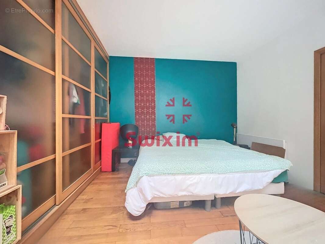 3472849_896983_photo_8.jpg - Appartement à PARIS-11E