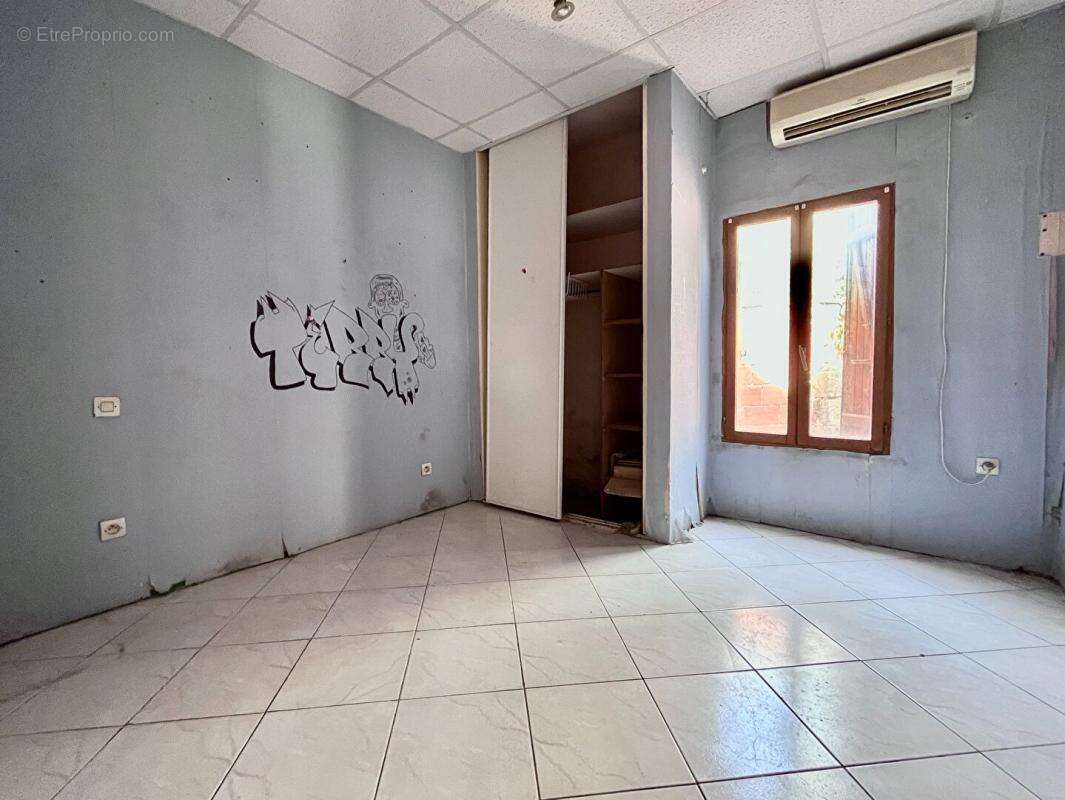 Maison de plain-pied de 95 m² environs avec travaux à prévoir sur un terrain de 509 m² proche de l'aéroport - photo 7