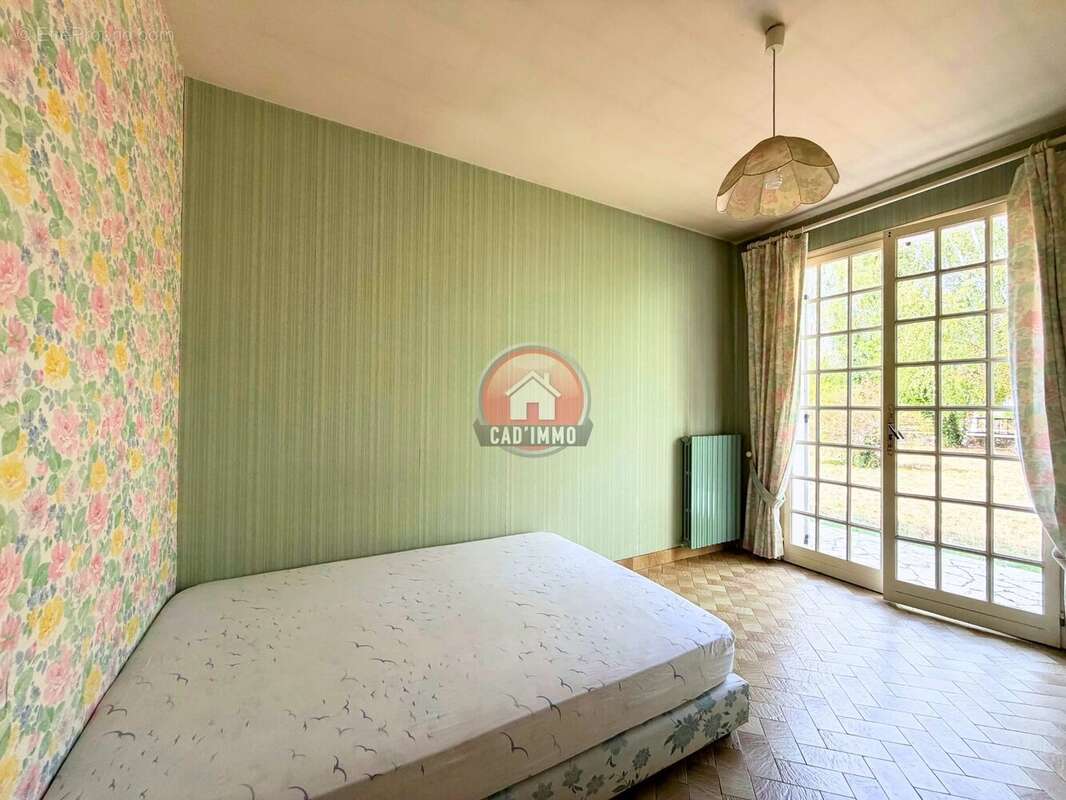 Plain pied de 116 M² 4 chambres, et garage. - photo 7