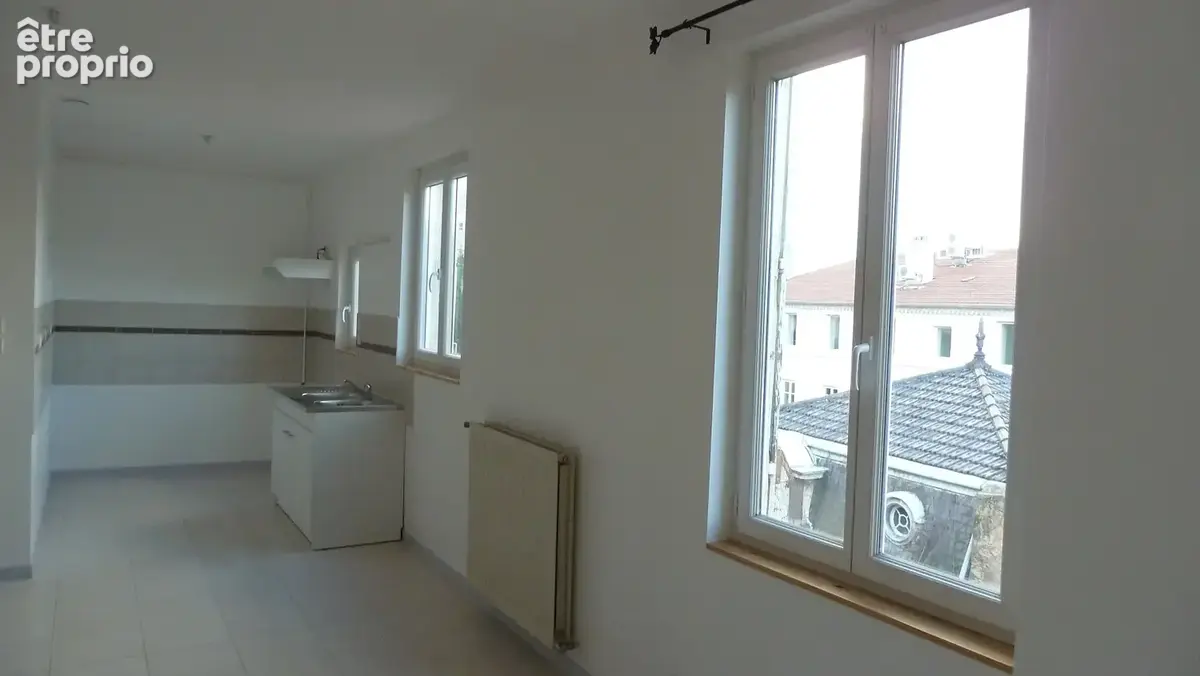 Proche centre-ville, immeuble de rapport avec  4 appartement et  12  lots de parkings. - photo 6