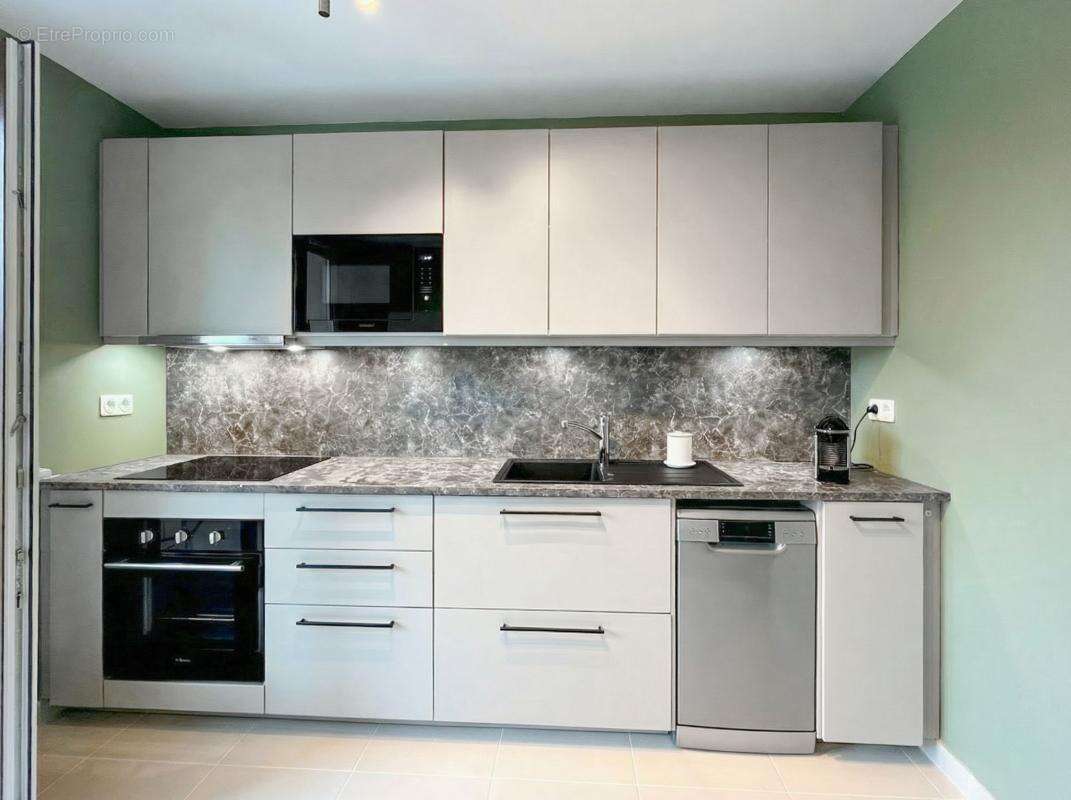 Studio 30.73m² avec balcon et cave - photo 2