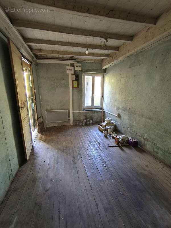 Maison à ESCOUTOUX
