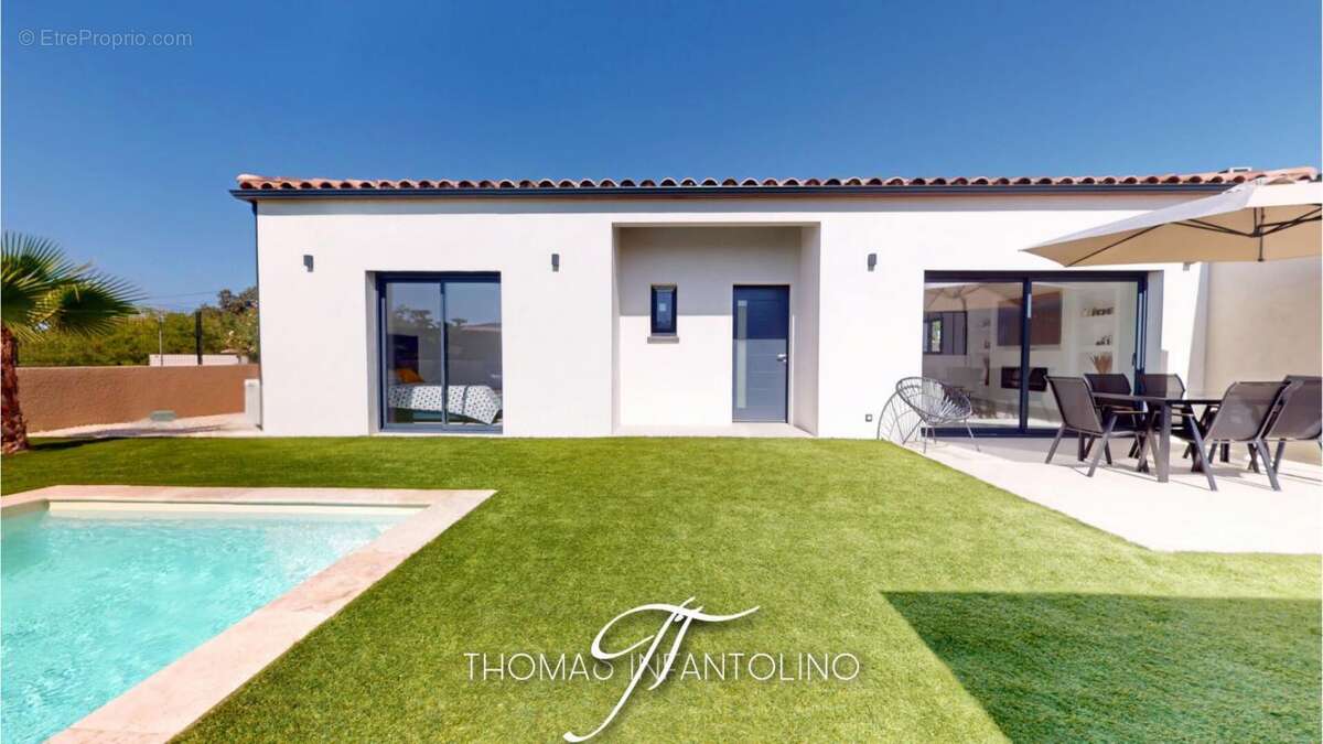 En exclusivite - plain pied - 3 chambres - 1 suite parentale - salle de bain - salle d'eau - piscine - pool house - photo 7