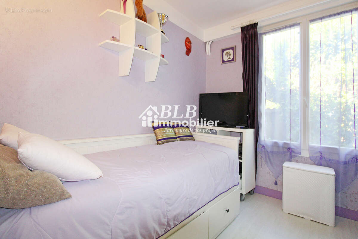Maison de plain-pied 94m2  3 chambres + garage - photo 8