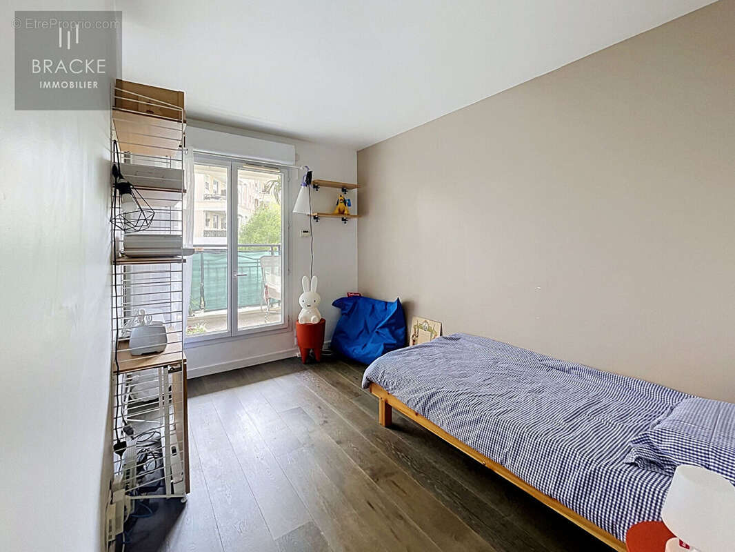 Appartement Courbevoie  Faubourg  4 pièces 75 m² - photo 9