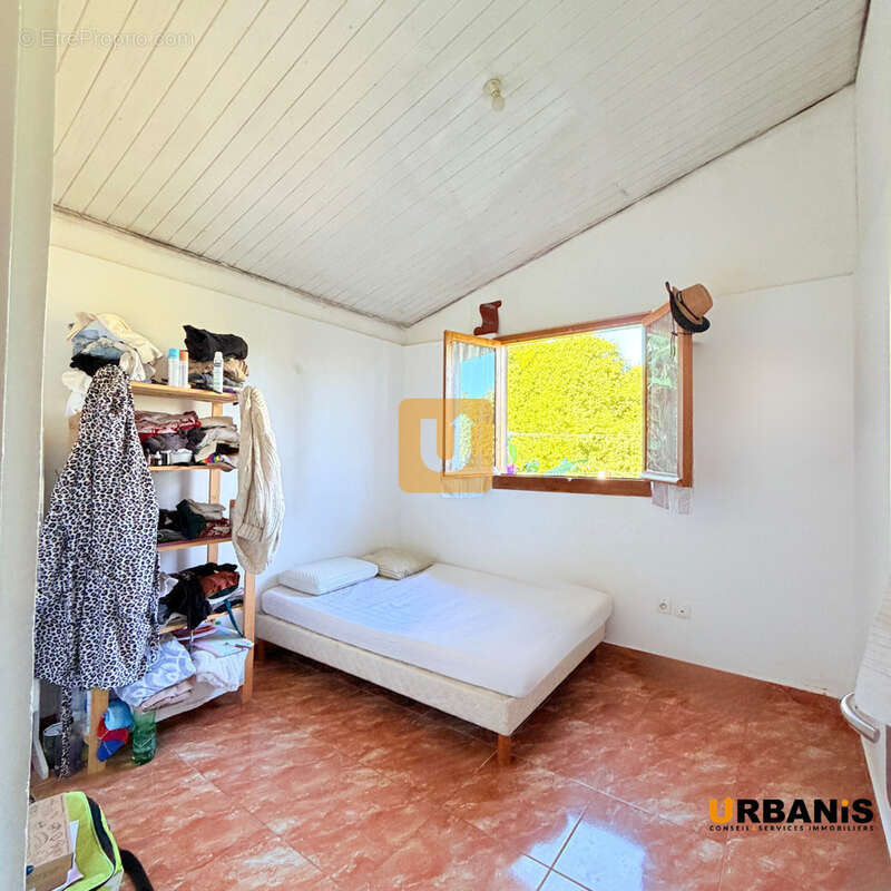 Jolie maison a bois de nefles st paul edifiee sur une parcelle d'environ 500m2 - photo 8