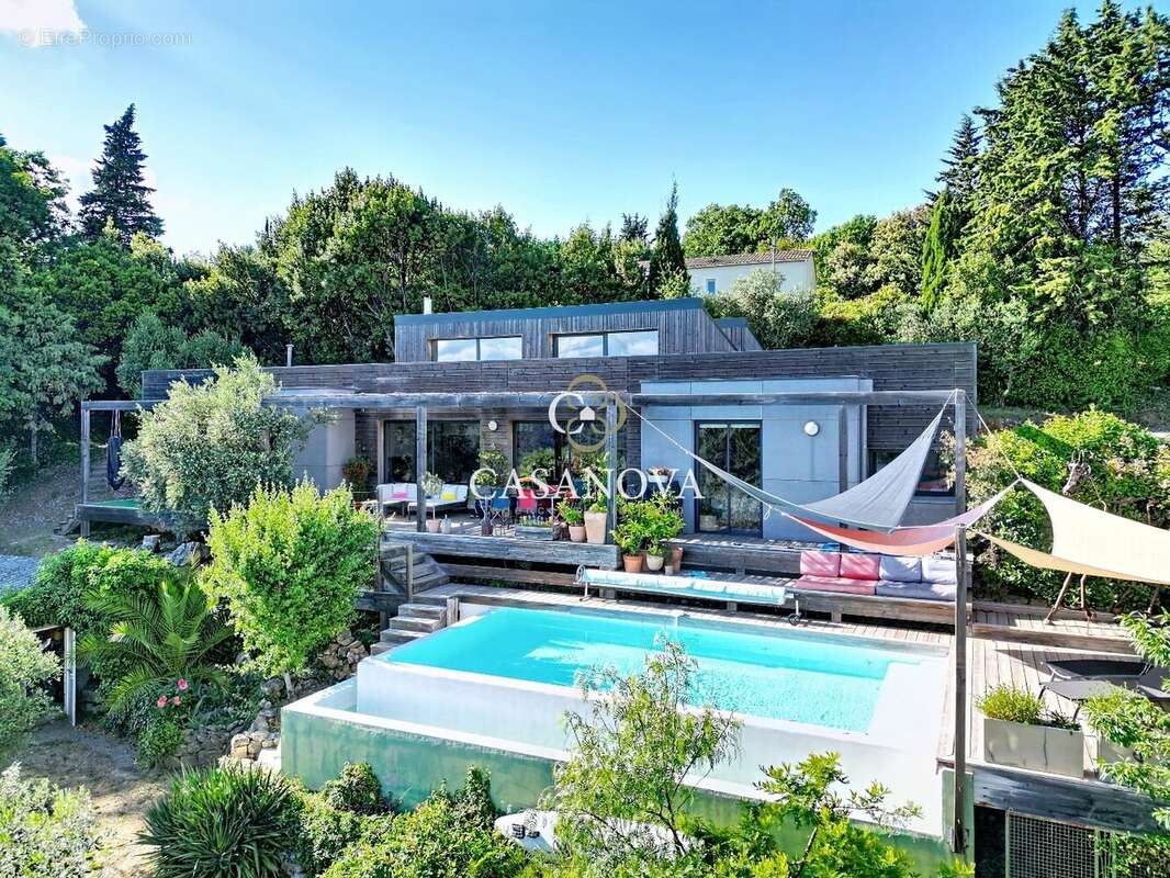 Villa d'architecte contemporaine avec piscine à débordement chauffée et vue panoramique exceptionnelle sur les hauteurs de Lodèv - photo 3