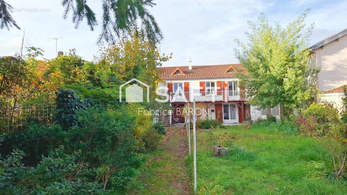 Photo 1 - Maison à BONNEUIL-MATOURS