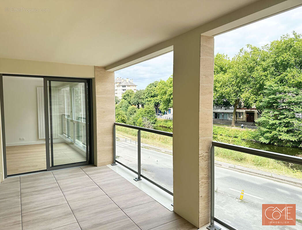 Grand type 3 neuf de standing - 12m² de terrasse - vue canal de l'ille - anatole france - rennes - photo 4