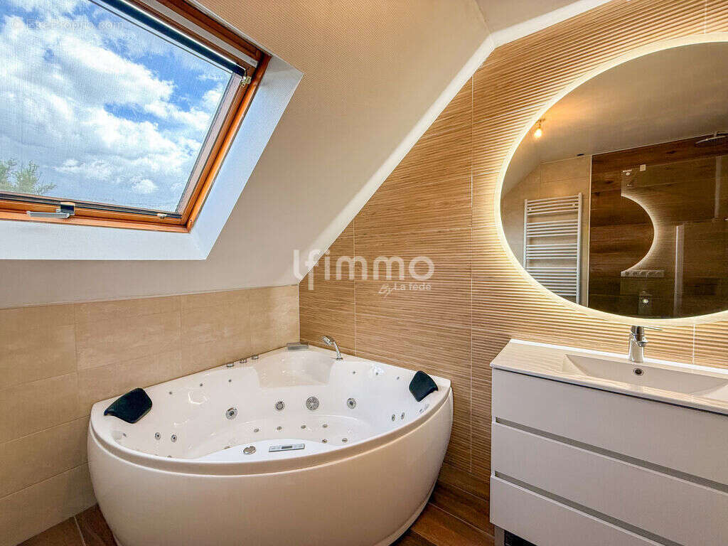 Maison bi-famille de 155m² sur 6,70 ares en quartier résidentiel - photo 10