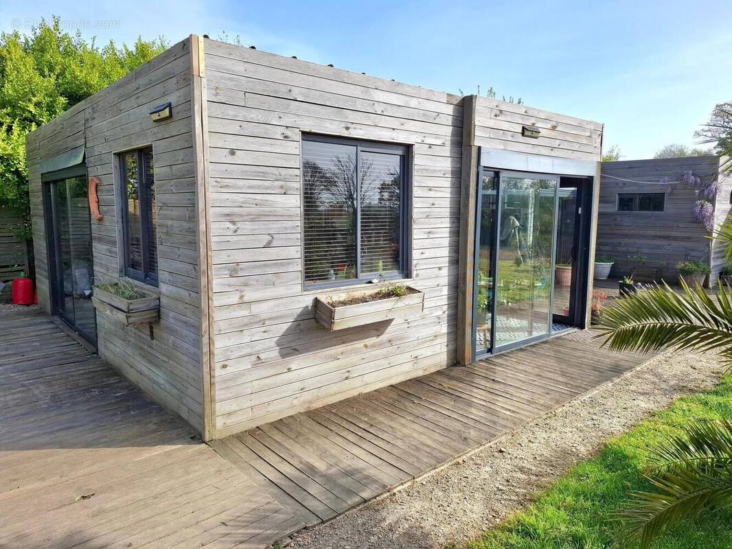 Photo 1 - Maison à RAUVILLE-LA-PLACE