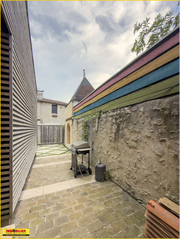 Magnifique rénovation Centre PODENSAC - photo 3