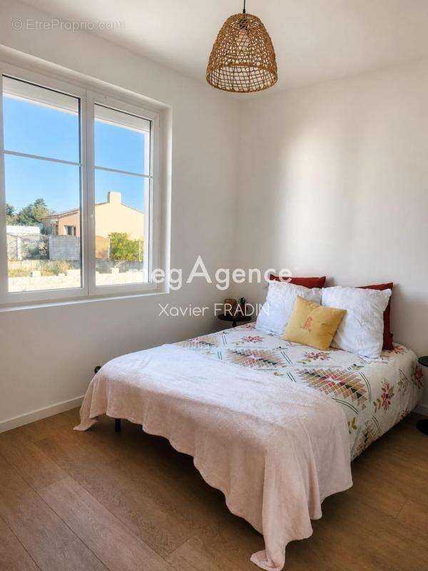 Appartement entièrement rénové avec sous-sol de 48 m² – Stationnement privatif - photo 4