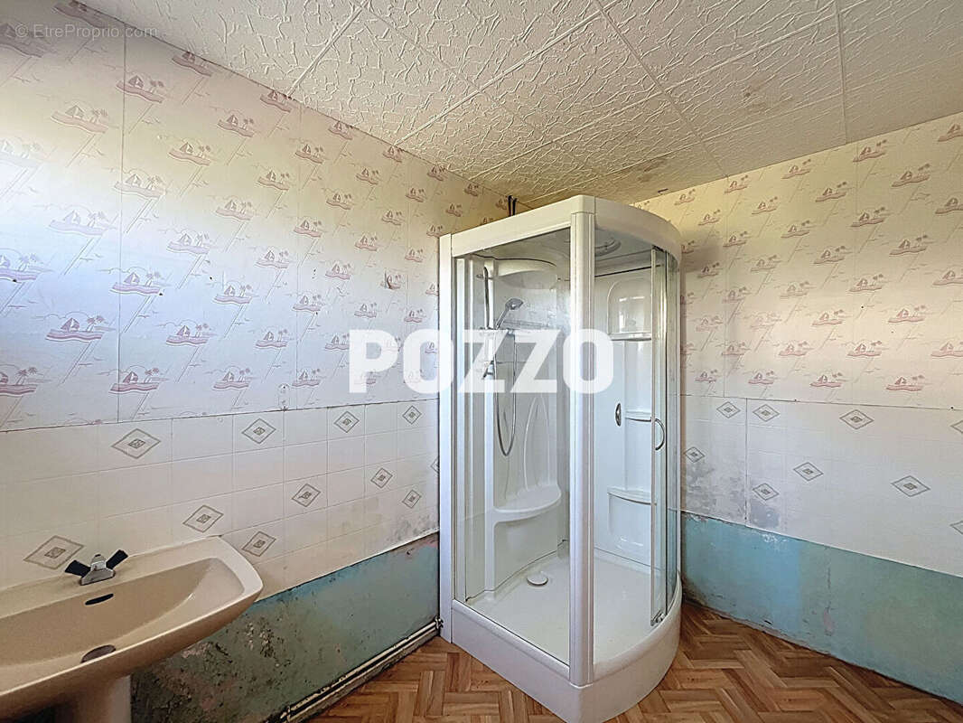 Maison à JUVIGNY-LE-TERTRE