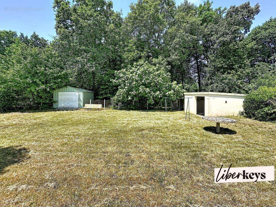 Maison de plain pied avec parc boisé - photo 8