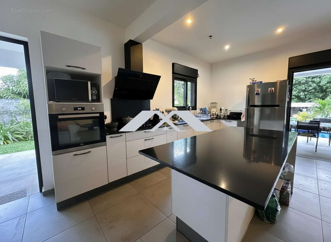 Maison 118 m² à Saint-Joseph  - photo 5