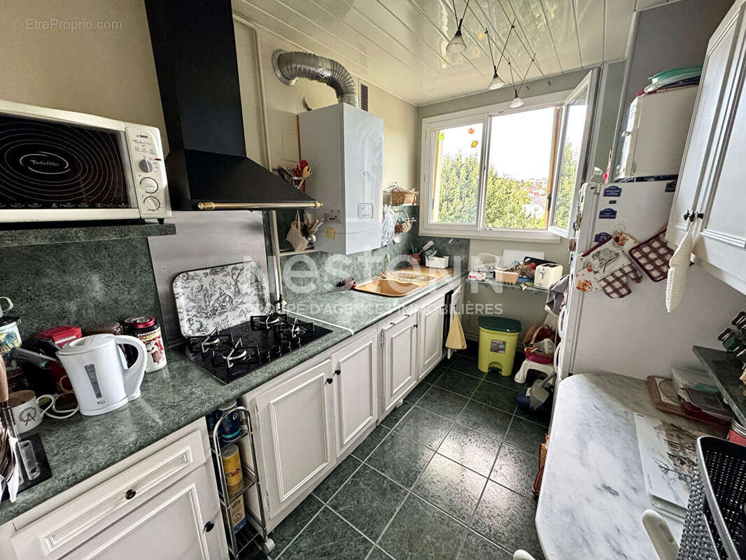 Appartement 3 pièces 57 m² avec parking, cave et proche gare RER C à Étampes - photo 5