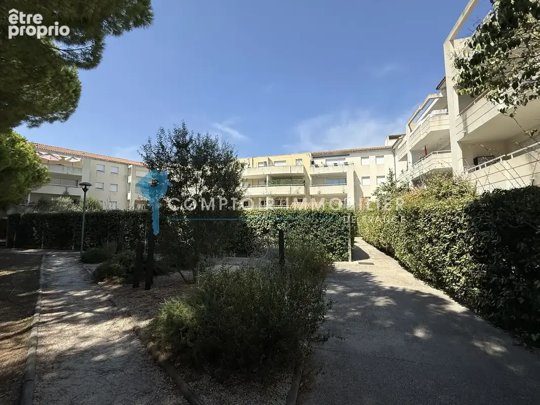 Appartement P3 en rez de jardin avec parking fermé - photo 4