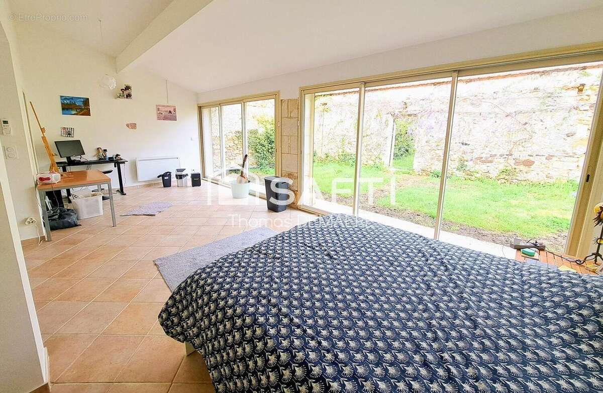 Photo 7 - Maison à BUSSAC-FORET