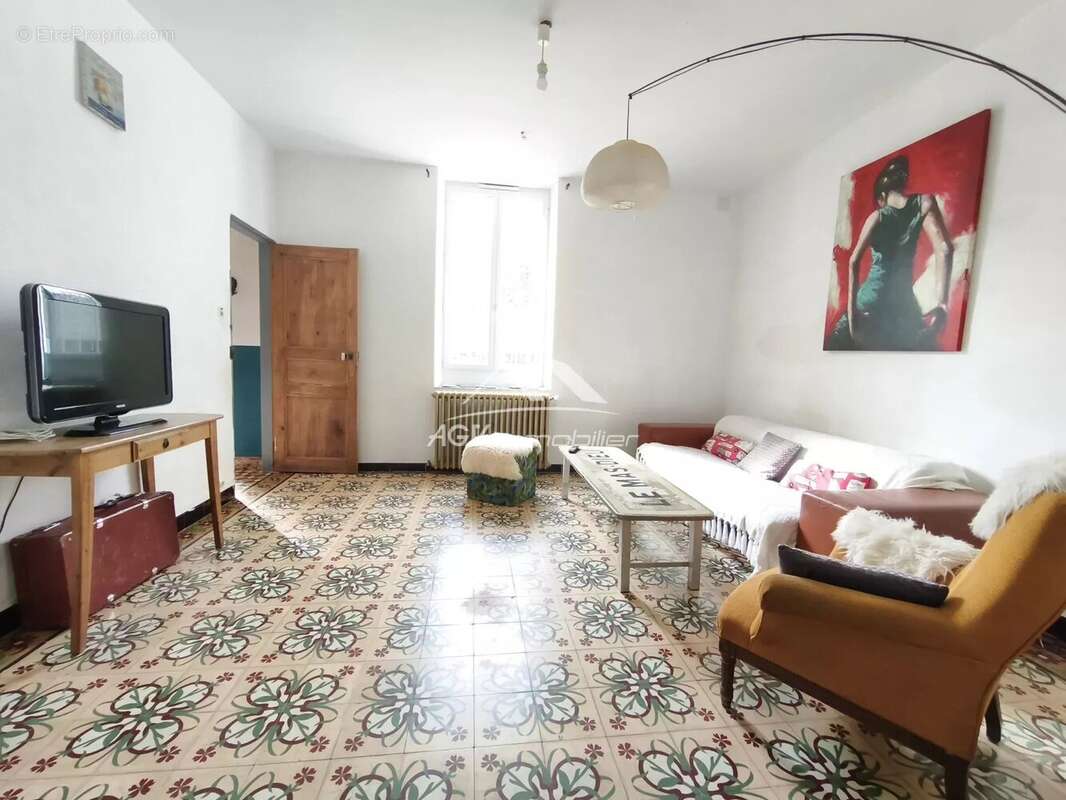 Maison à SAINT-JULIEN-LES-ROSIERS