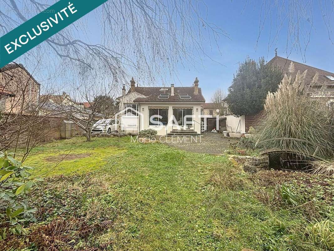 Photo 2 - Maison à BRIE-COMTE-ROBERT