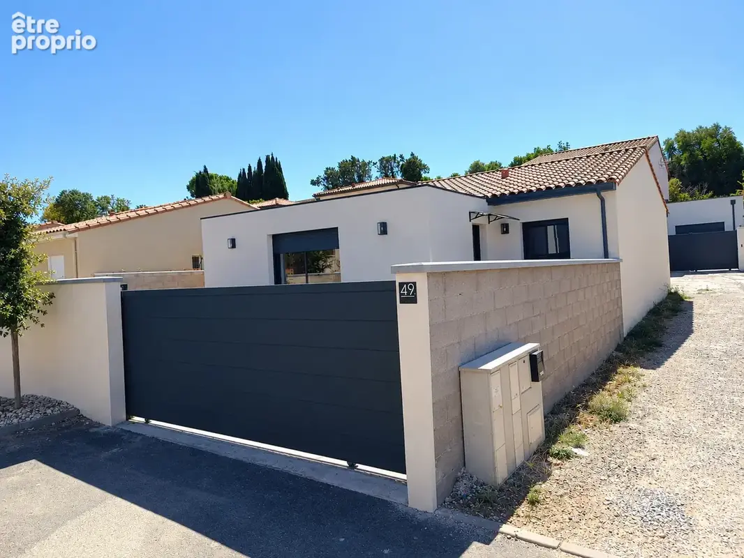 Maison de plain-pied T4 de 96 M2 sur 326 M2 de terrain - photo 4