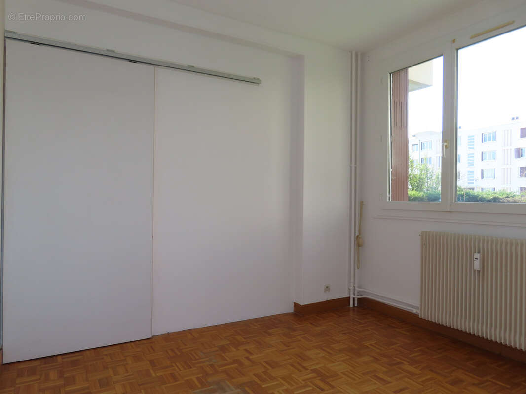 Appartement T3 avec jardin, cave et parking - photo 10