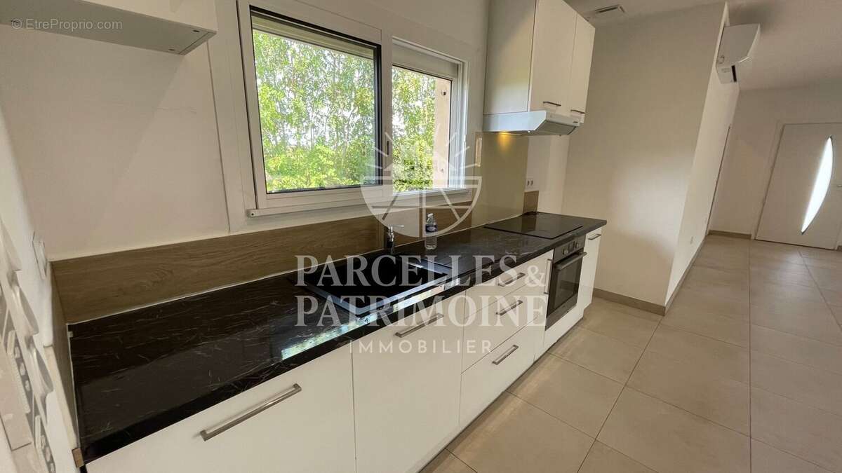 EXCLUSIVITÉ  Maison de plain-pied T4 de 98m² avec sous sol total sur un terrain de 1 209m² - photo 5