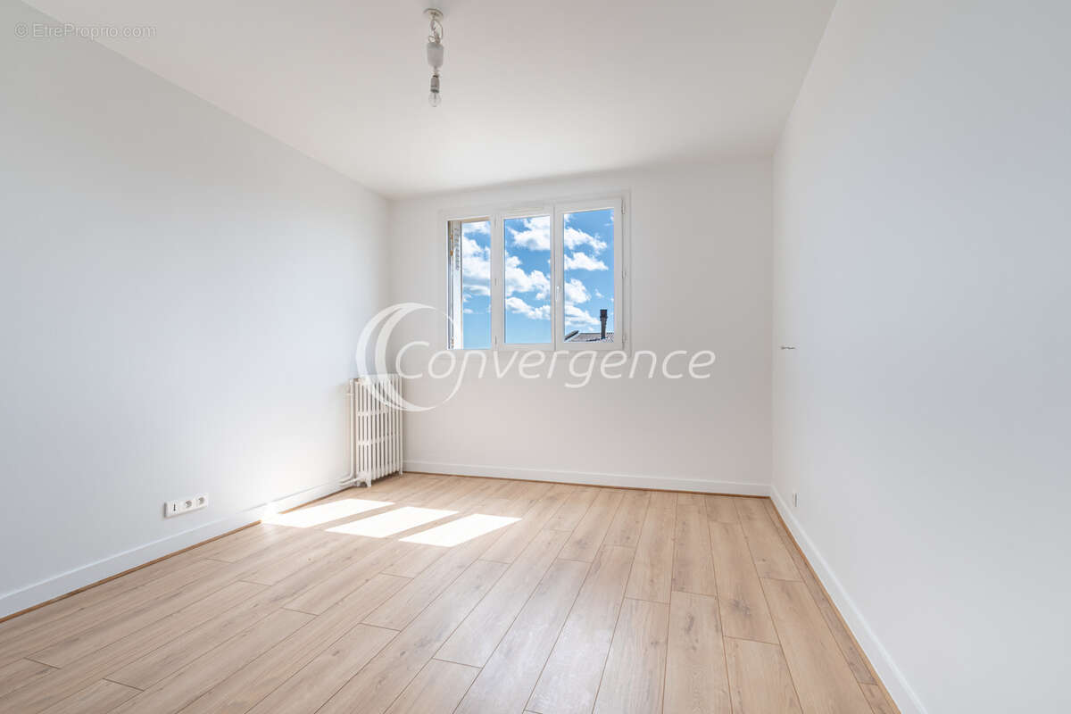 Appartement T4 rénové avec 3 chambres et ascenseur - photo 5