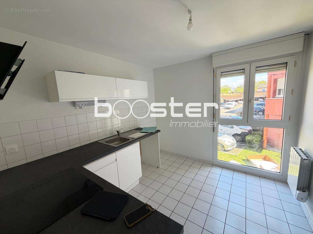 Bonnefoy- Bel appartement T4 avec balcon, parking et cave, au calme - photo 3