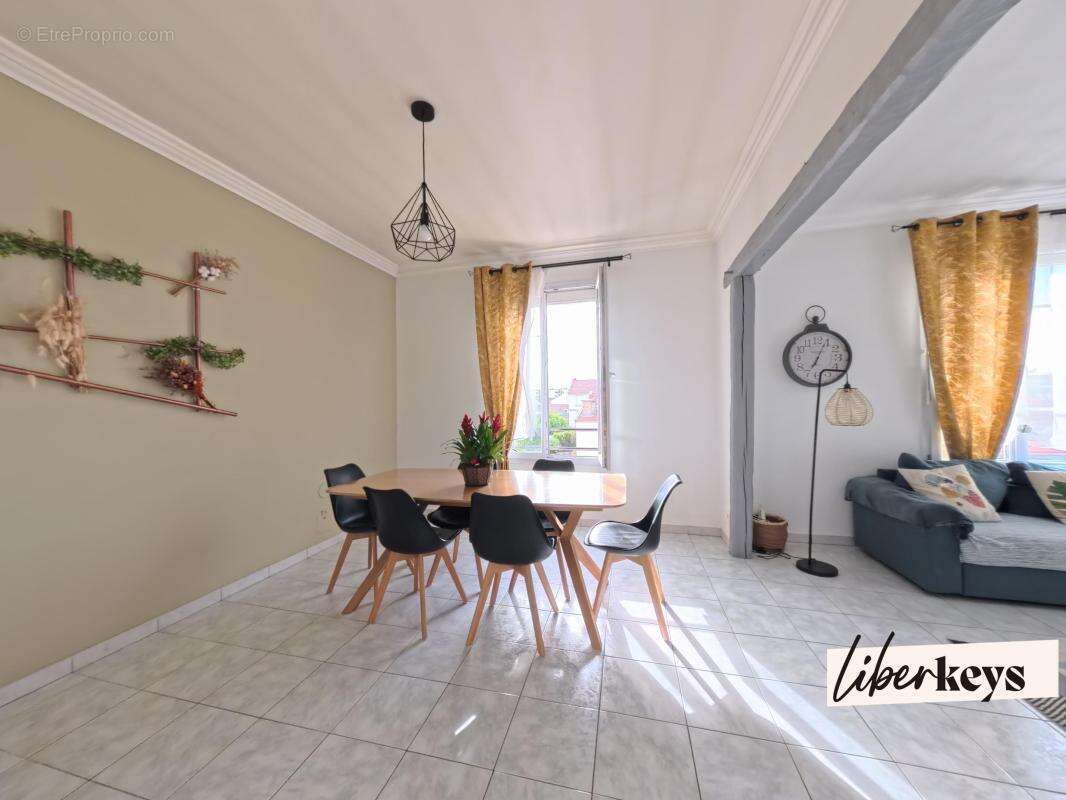 Appartement T4 - photo 2