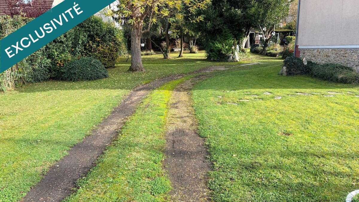 Photo 2 - Maison à EZANVILLE