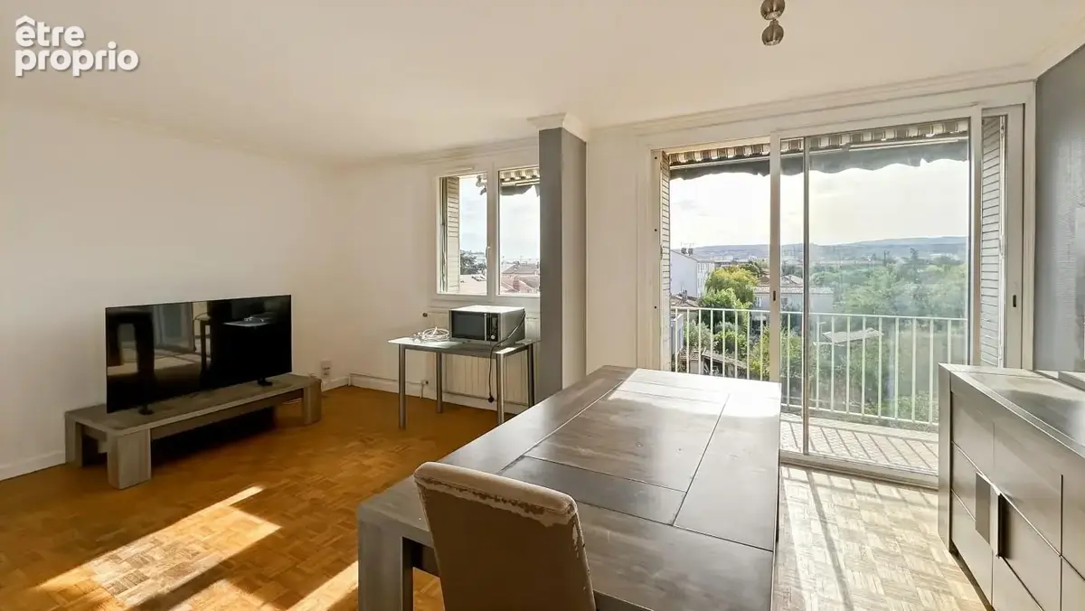 Valence - T4 de 75 m² - balcon - cave - cellier - place de parking privative - photo 3