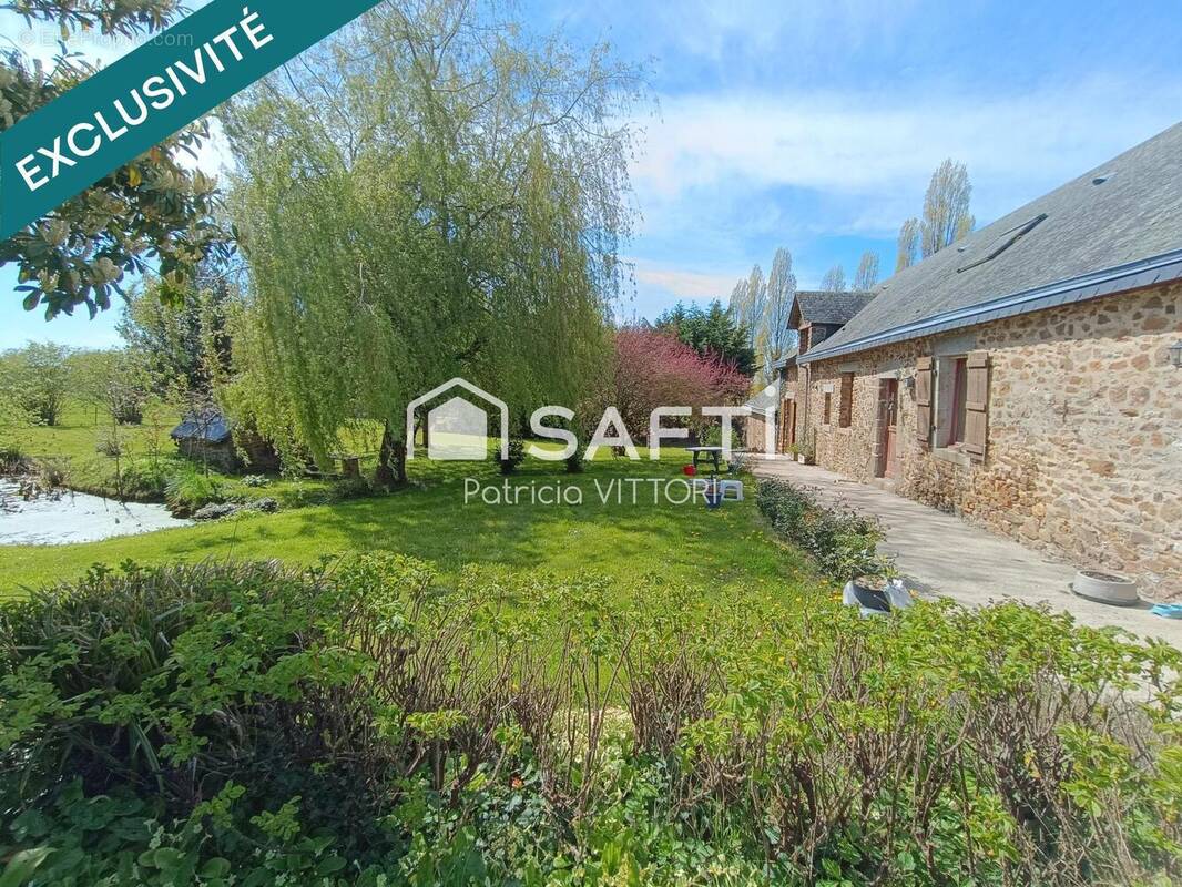 Photo 1 - Maison à LE BOURGNEUF-LA-FORET