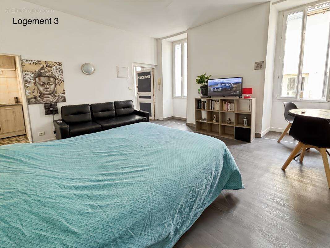 Appartement 80 m² à Saintes  - photo 11