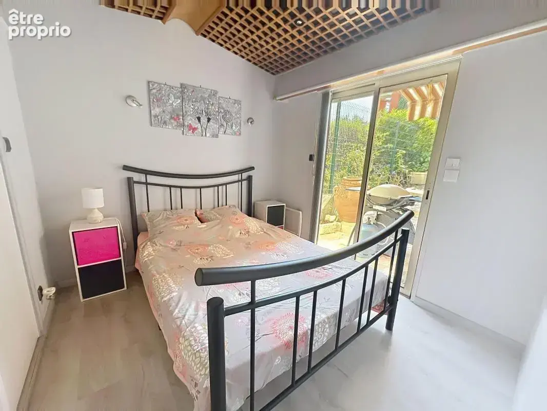 2/3 pièces en rez-de-jardin avec garage et cave dans une résidence de standing avec piscine - photo 9
