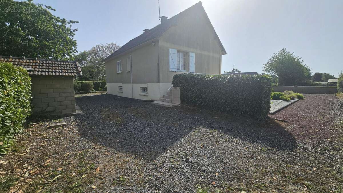 Maison à CAVIGNY