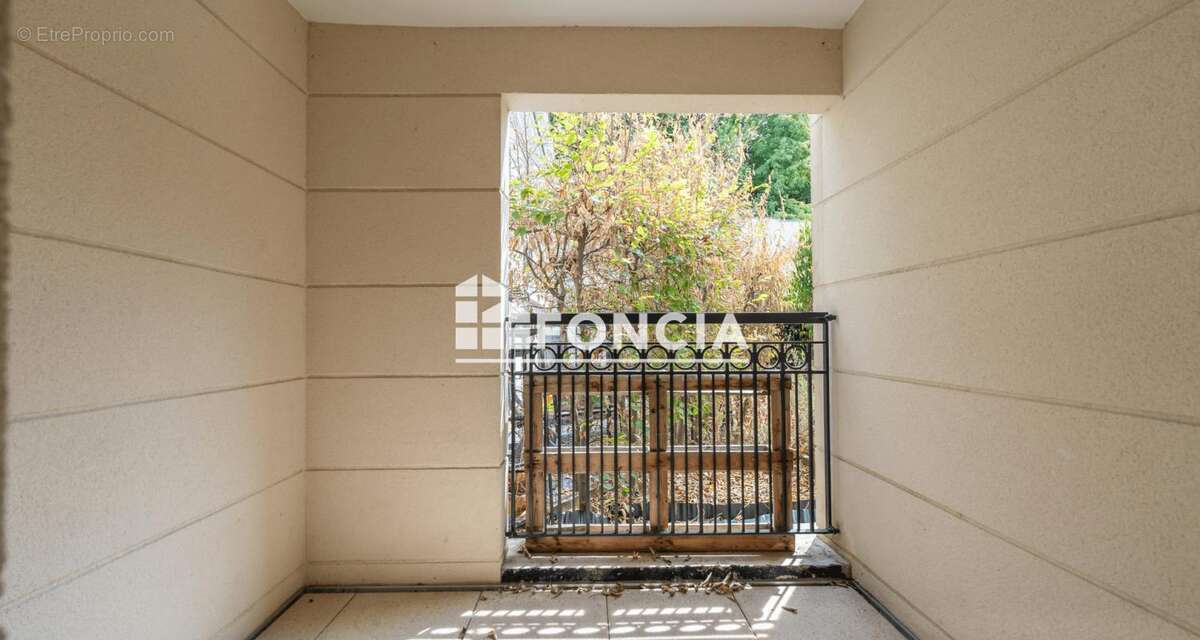 3 pieces en rez de jardin, cave et parking en sous-sol - photo 6