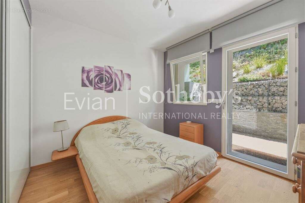 Rare, Evian, T4 en rez de jardin surélevé de 113 m2 avec vue lac et terrasse de 82 m2. - photo 10