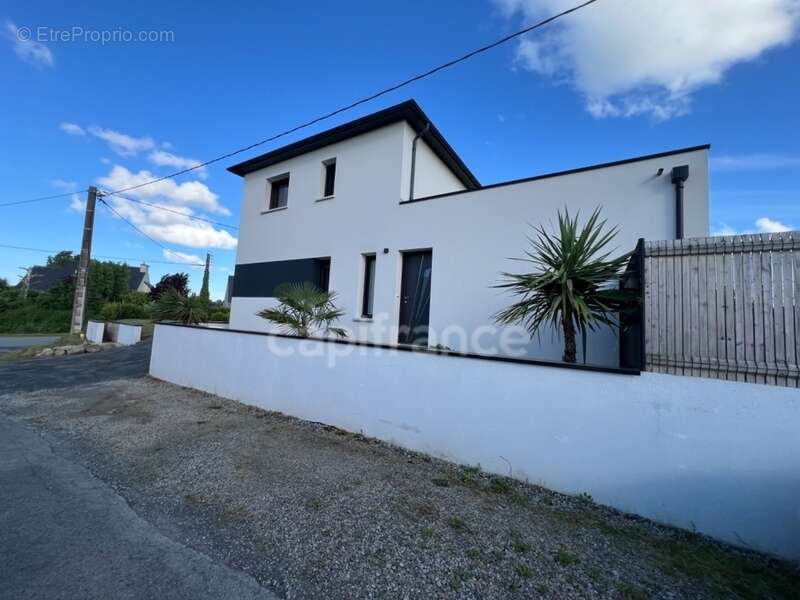 EXCLUSIVITÉ – Élégante maison contemporaine aux prestations soignées, à deux pas du bourg de Pommeret - photo 2