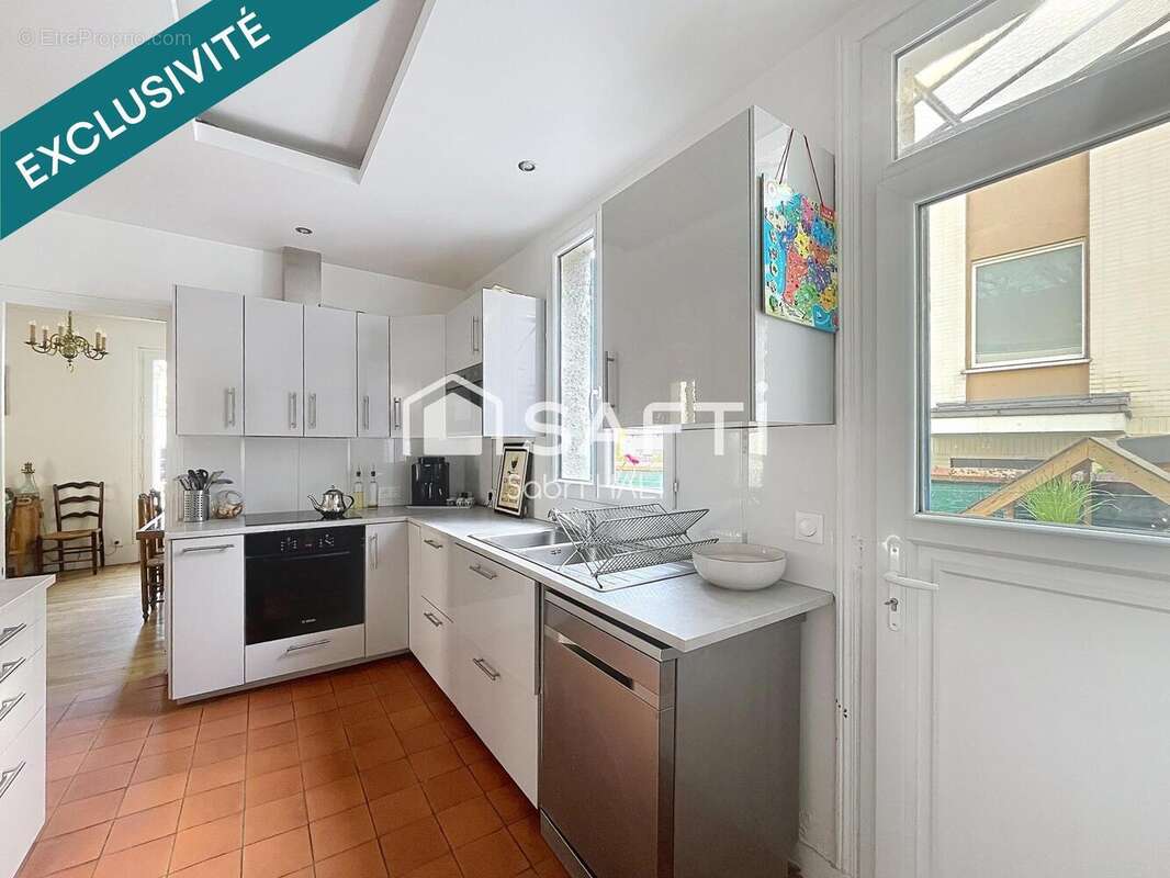Photo 8 - Maison à COURBEVOIE