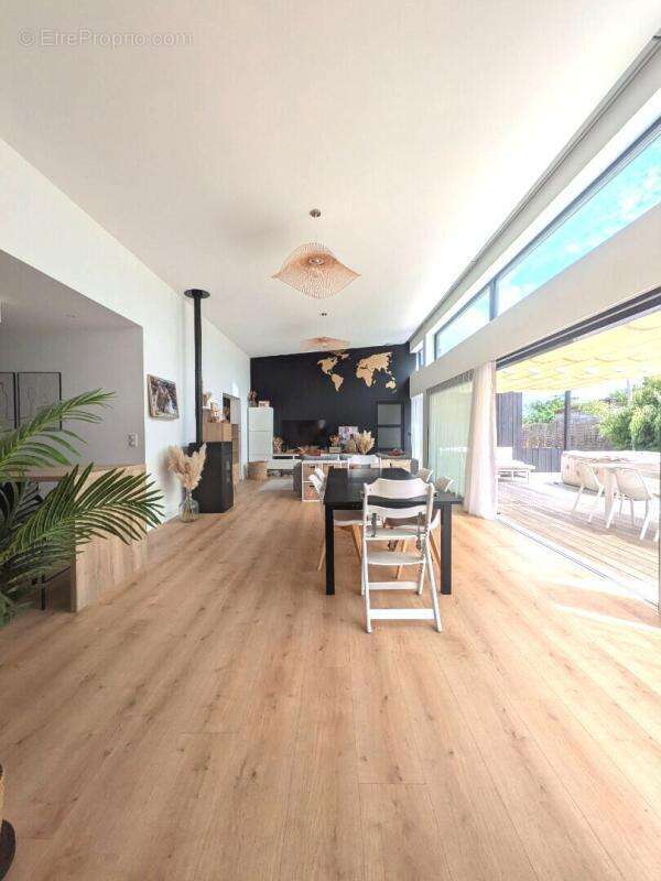 Maison de 150 m² aux performances passives - Un confort de vie exceptionnel au coeur de la nature - photo 6