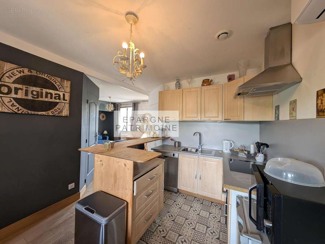 n°8 - Maison à SAINT-LAURENT-DE-MURE