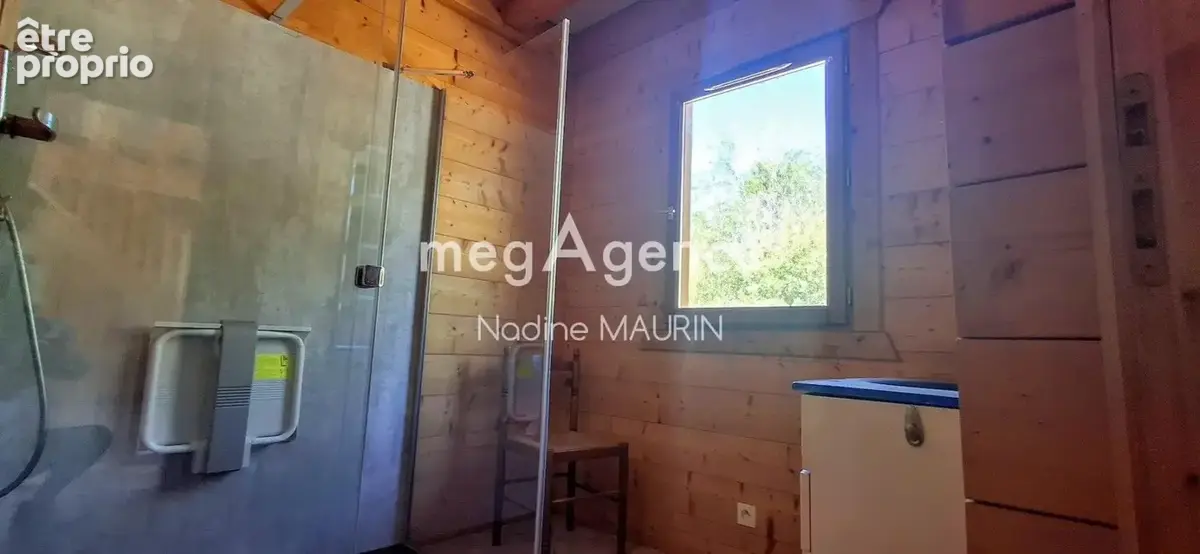 Chalet en bois de 138 m² de 4 chambres sur un terrainde 73862m² - photo 8