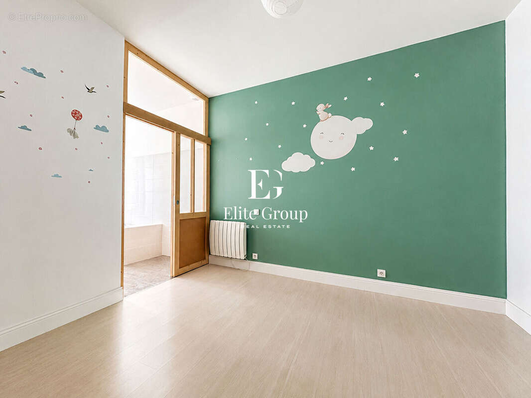 Élégant appartement esprit maison de ville avec terrasse sur les toits - photo 11