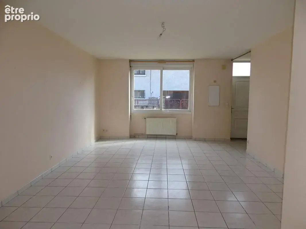 Immeuble comprenant 4 appartements + caves, jardin et parkings - photo 3