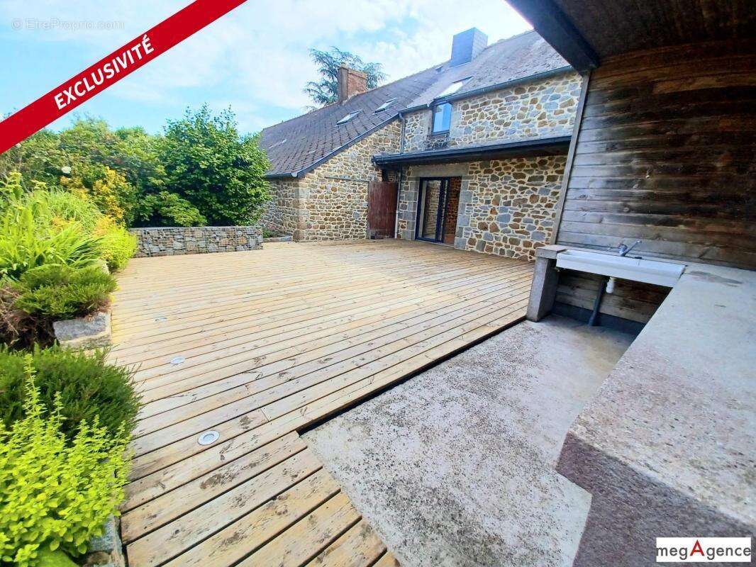 Maison à SAINT-BRICE-EN-COGLES