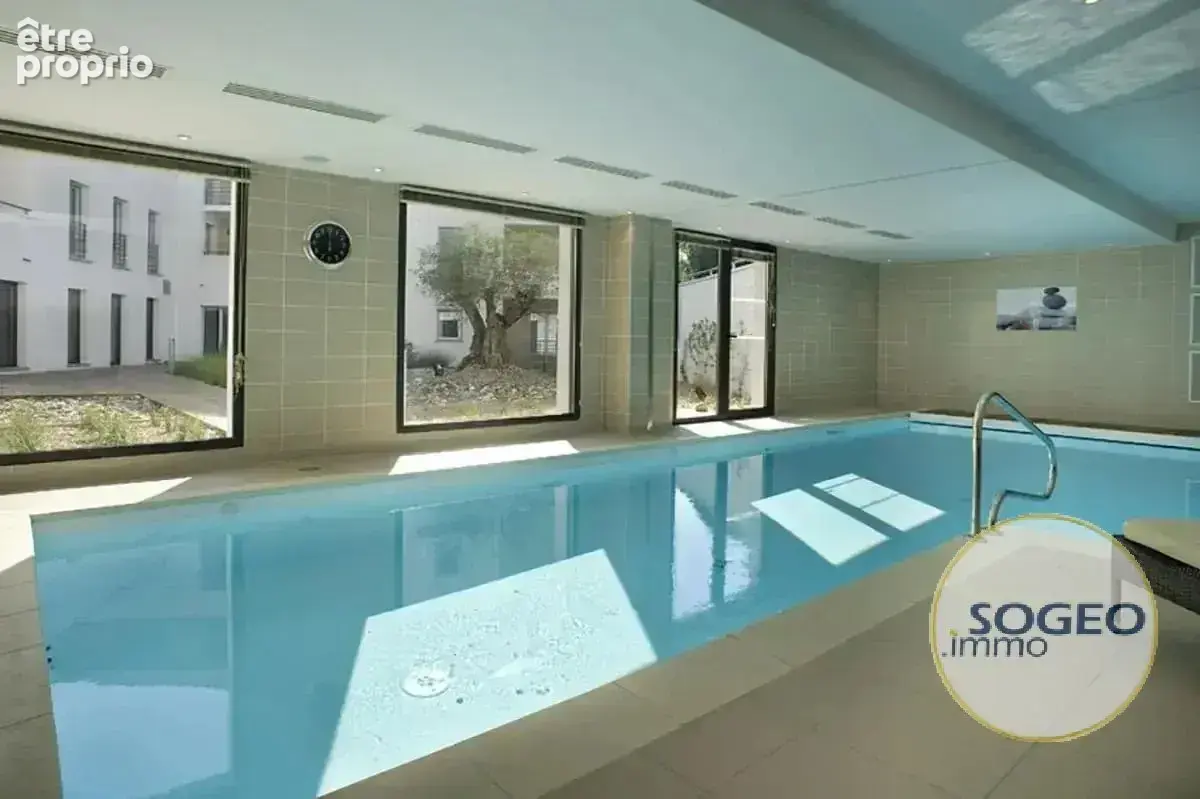 Appartement T3 - 66m² en résidence services avec place de parking - photo 8