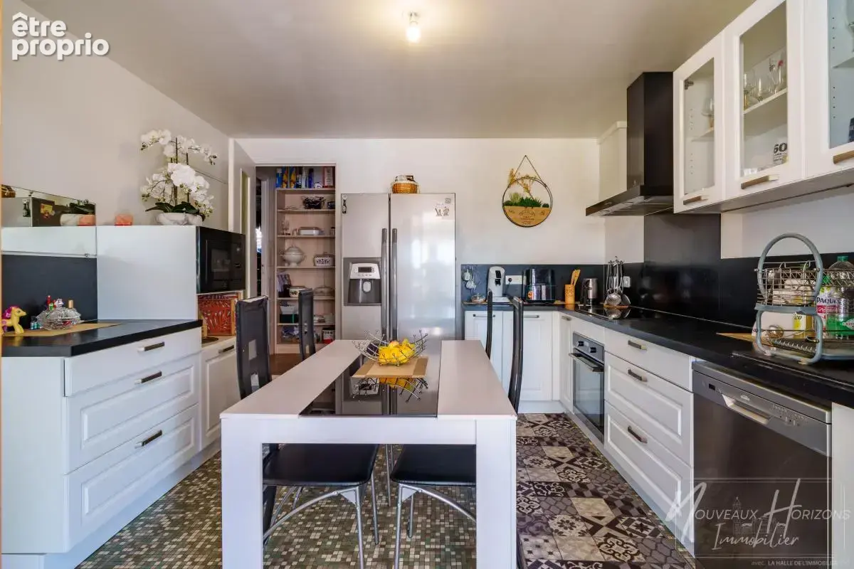 Maison 5 pièces 103 m² à vendre à Aixe-Sur-Vienne (87700) - photo 4